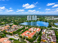 Miami Suburb Panorama with Reflective Lake